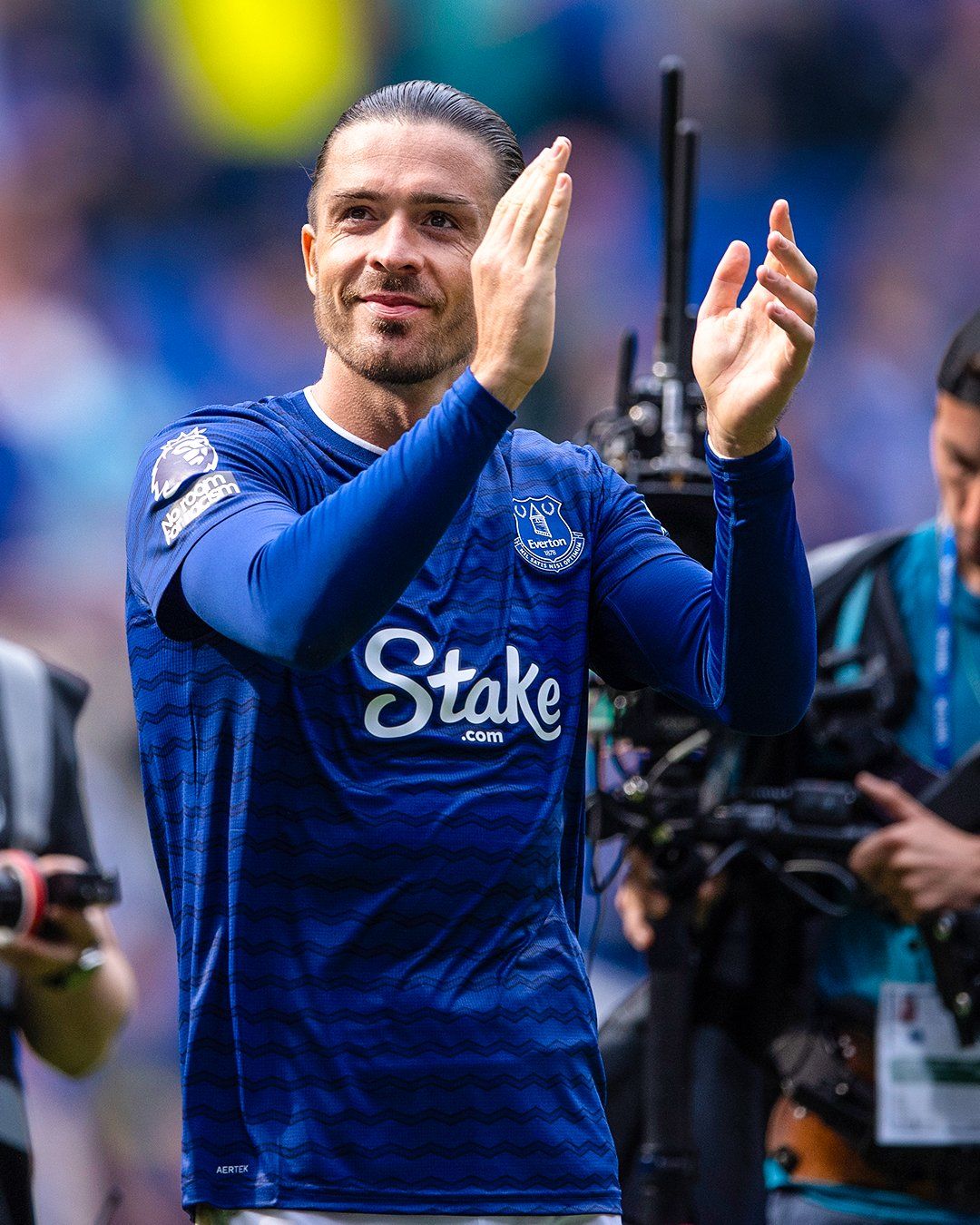 Jack Grealish celebrating with Everton teammates